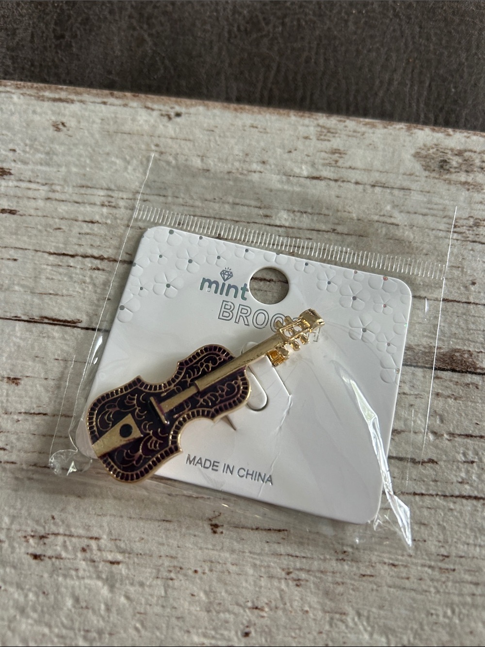 5/$25 Mint Gold and Black Guitar Enamel Brooch